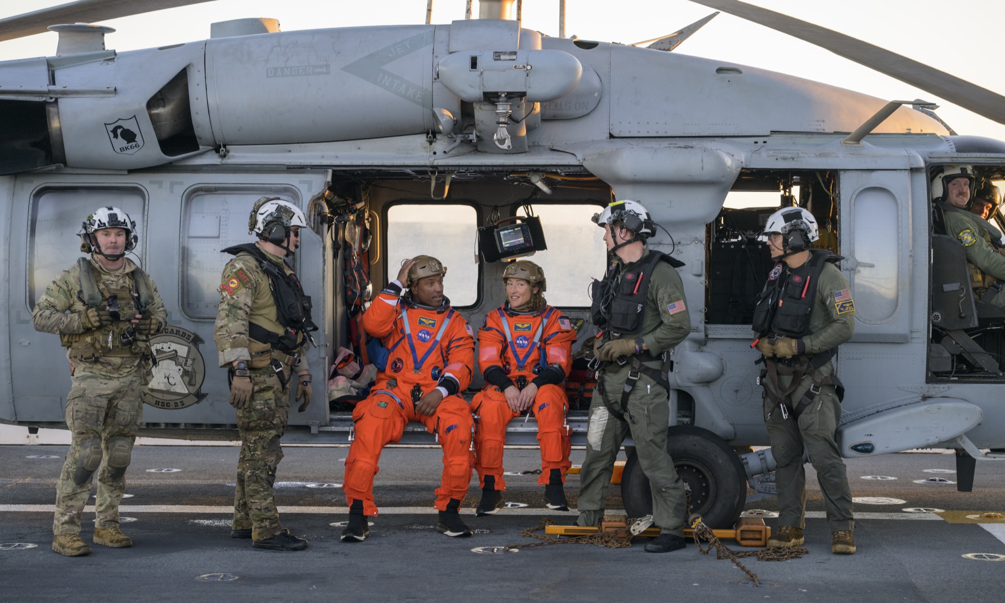 Pilot Victor Glover (left) and mission specialist Christina Koch after splashdown recovery.