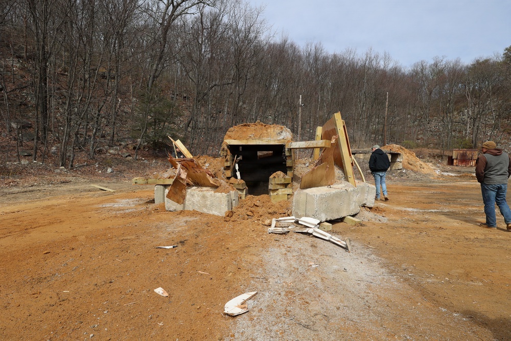 Aftermath of an earlier BRAKER test against a reinforced bunker, with the roof blown inward.